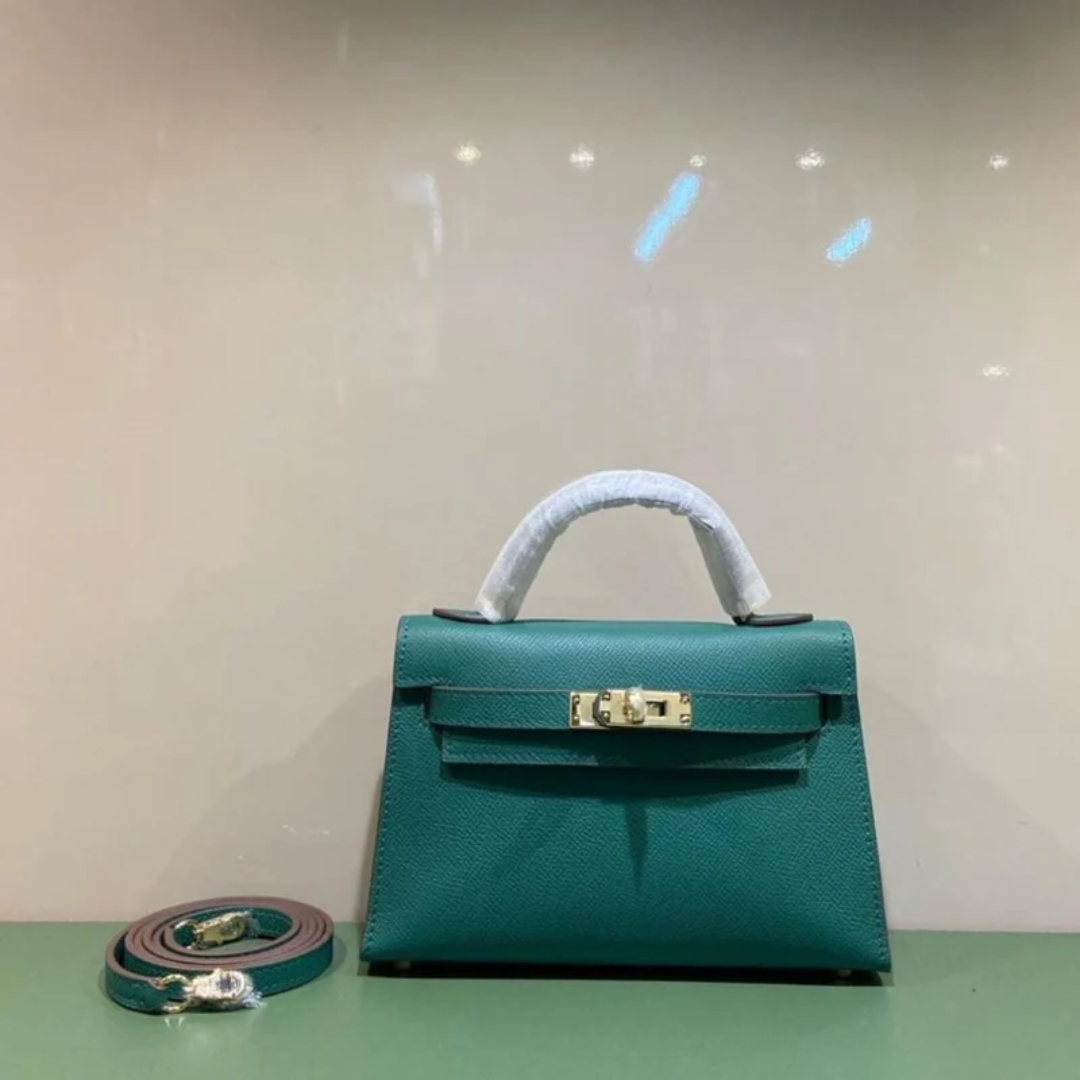 Tasche 20 Kly mit Goldbeschlägen in Grün