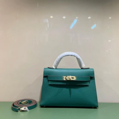 Tasche 20 Kly mit Goldbeschlägen in Grün