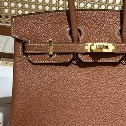 Tasche 25 Brk HSS Cr / GryTr aus Tg-Leder mit gebürsteten Goldbeschlägen